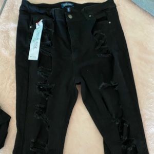 Skinny black ripped jeans plus